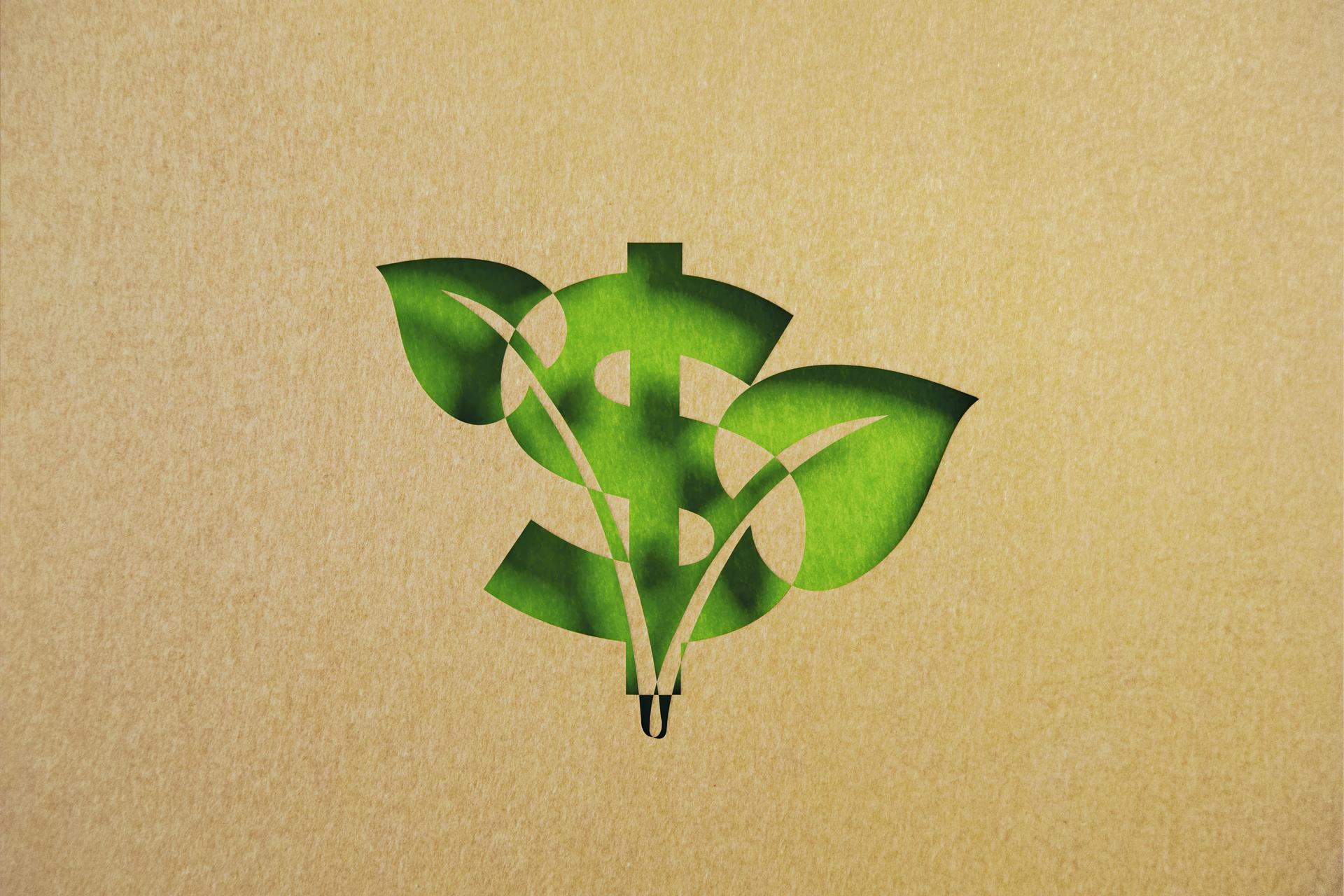 Sustainability Concept - Cut Out Leaf Shapes Made of Recycled Paper Intersect With American Dollar Sign On Green Background